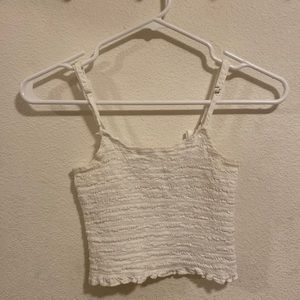 John Galt white textured tank top. From Brandy Melville so it’s one size (xs)